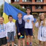 Ukrainian children with Ukraine flag at Surrey Heath House